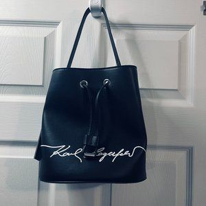 New KARL LAGERFELD PARIS  Logo Straps Crossbody  Bucket Bag Black and white